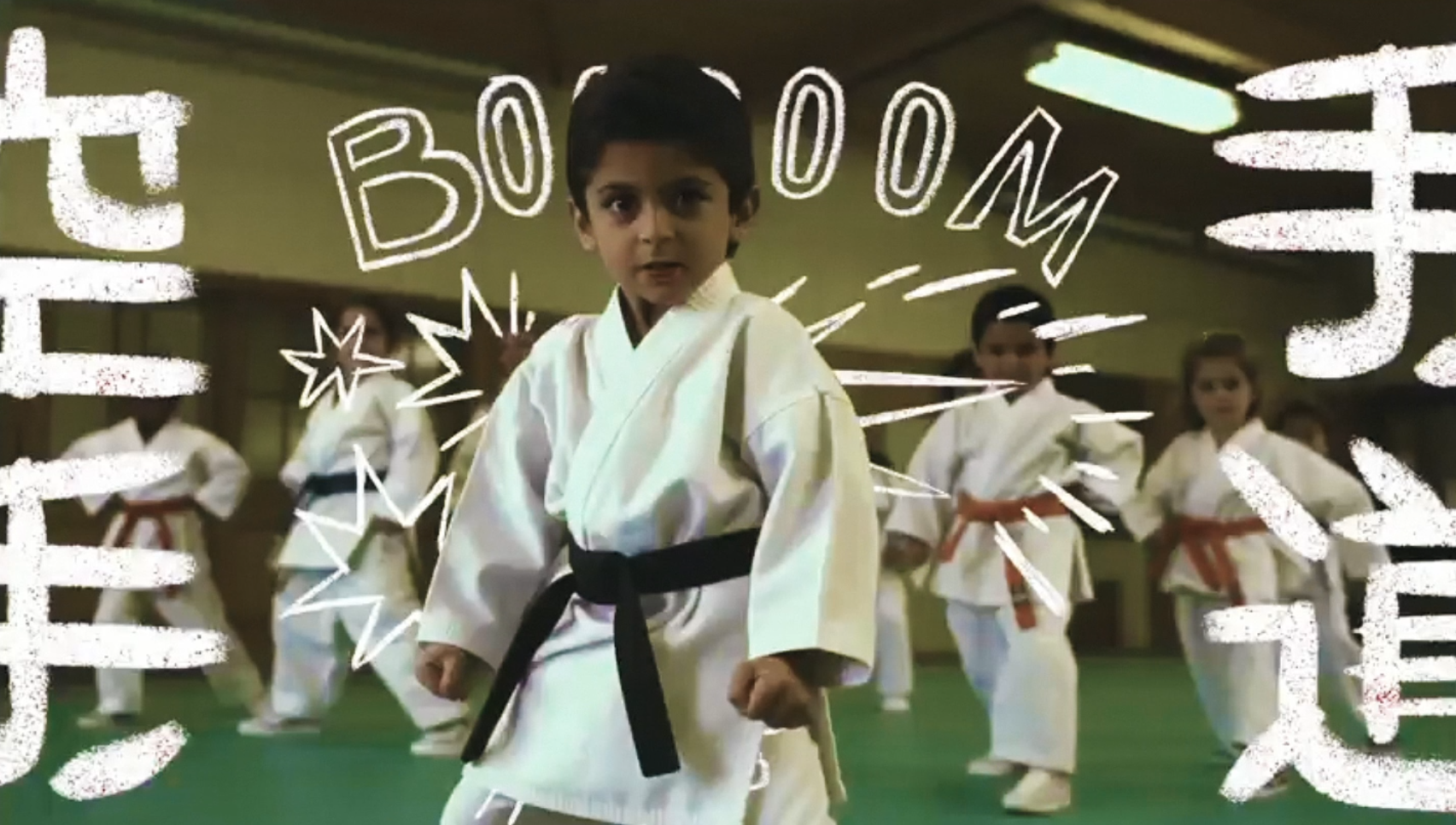 BSF Father's Day , young karate kid with hand-drawn doodles and the word boom